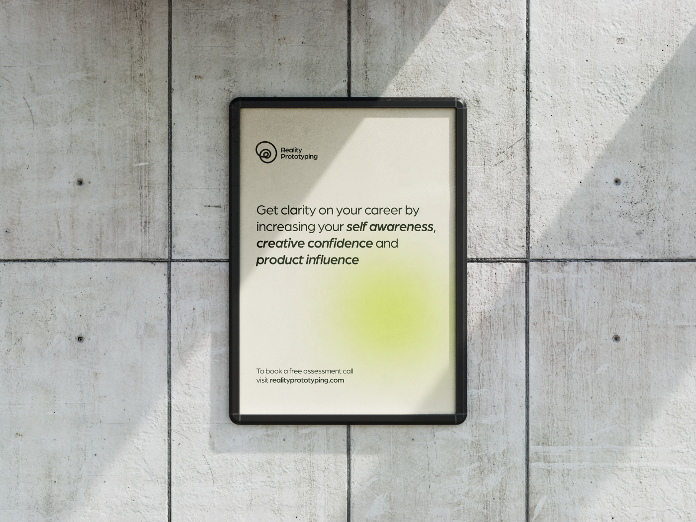 Poster design mockup on a concrete wall. The poster design for Reality Prototyping coaching with their tagline.