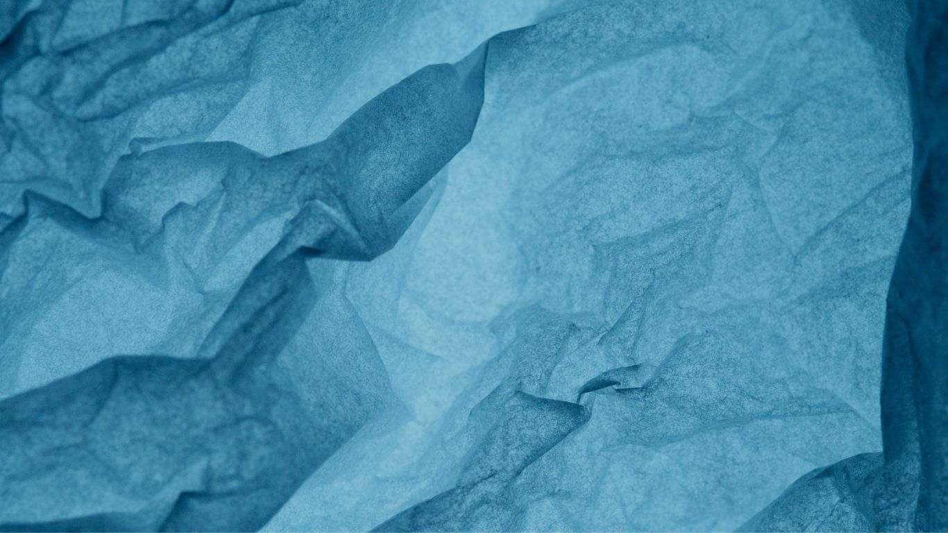 Голубая ткань вид сверху. Старинная бумага фон. Cold maroon