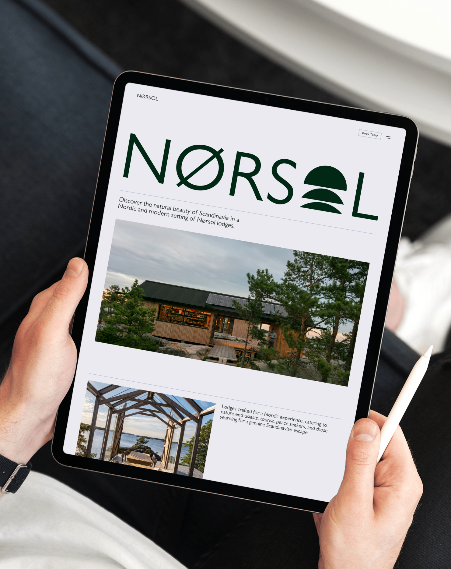 A laptop on a table mock up with the website design for Reality Prototyping coaching.