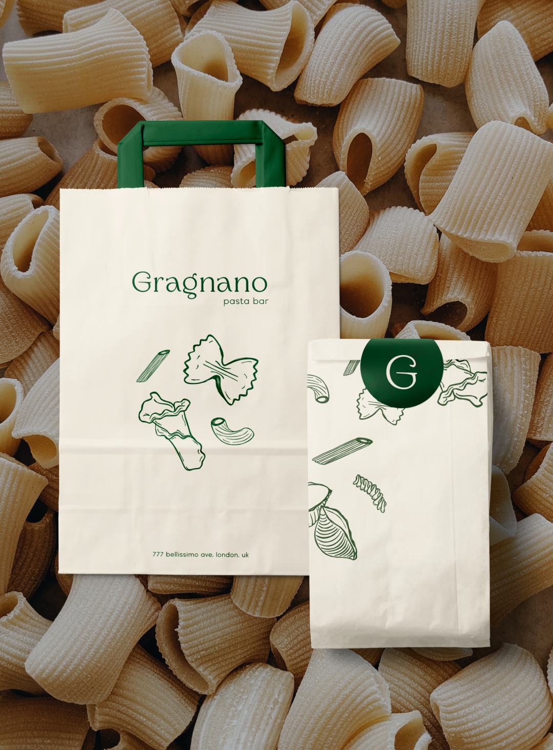 Packagin design mock up of a bag with a handle and a smaller paper bag with the restaurant branding.